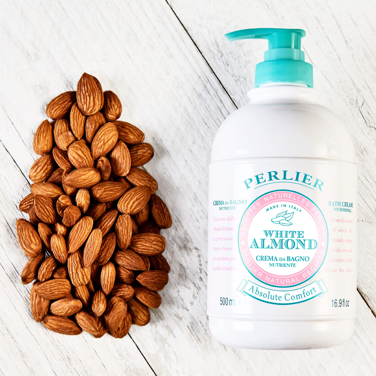 Perlier almond ingredients arranged to show cold-pressed Italian almond oil benefit
