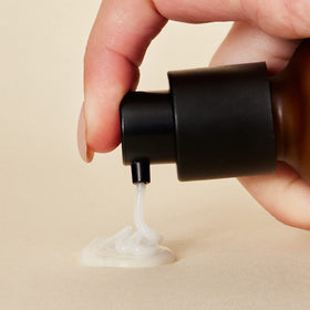 Perricone MD pump applying serum onto hand demonstrating smooth spreadability