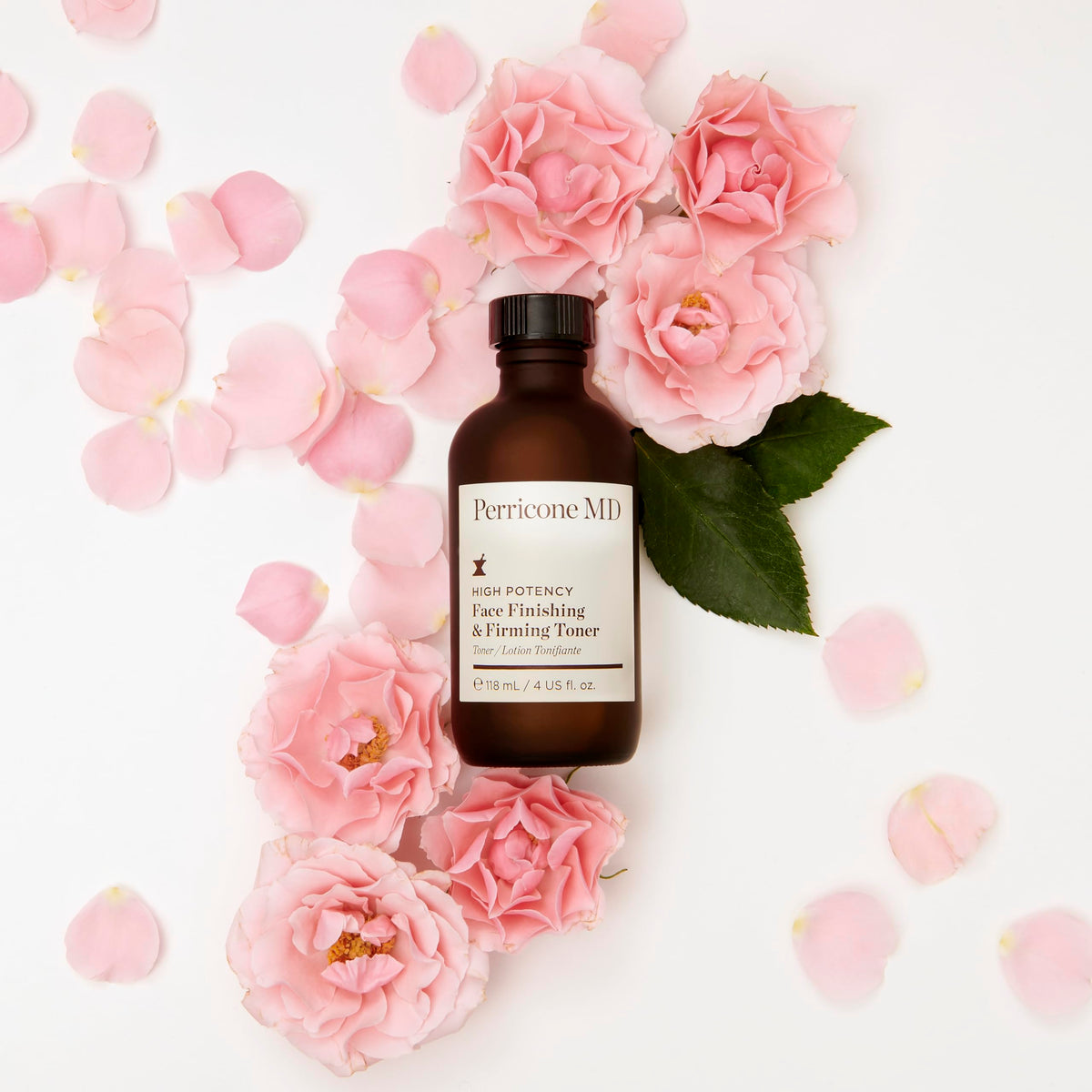 Perricone MD bottle in hand showing 4 fl oz scale and travel-friendly benefit