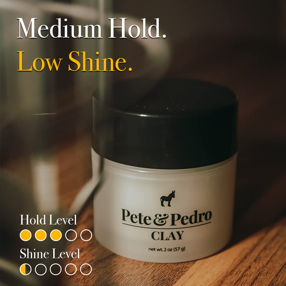 Hand scooping Pete & Pedro clay to demonstrate easy application and control