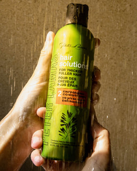Peter Lamas close-up of aloe and ginger botanicals for scalp soothing