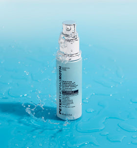 Peter Thomas Roth full-size bottle next to travel size for scale