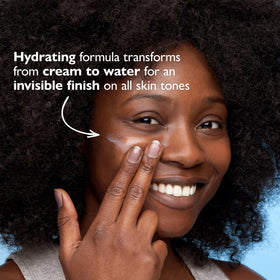 Peter Thomas Roth product being spread on skin demonstrating invisible, non-greasy finish