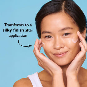 Peter Thomas Roth cream on fingertip displaying smooth spreadability benefit