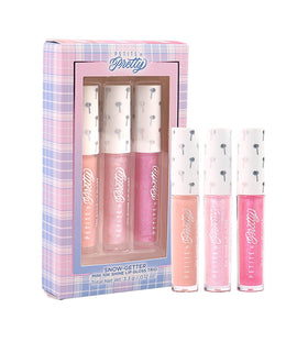 Petite 'N Pretty three glosses flatlay highlighting shade variety and sparkle