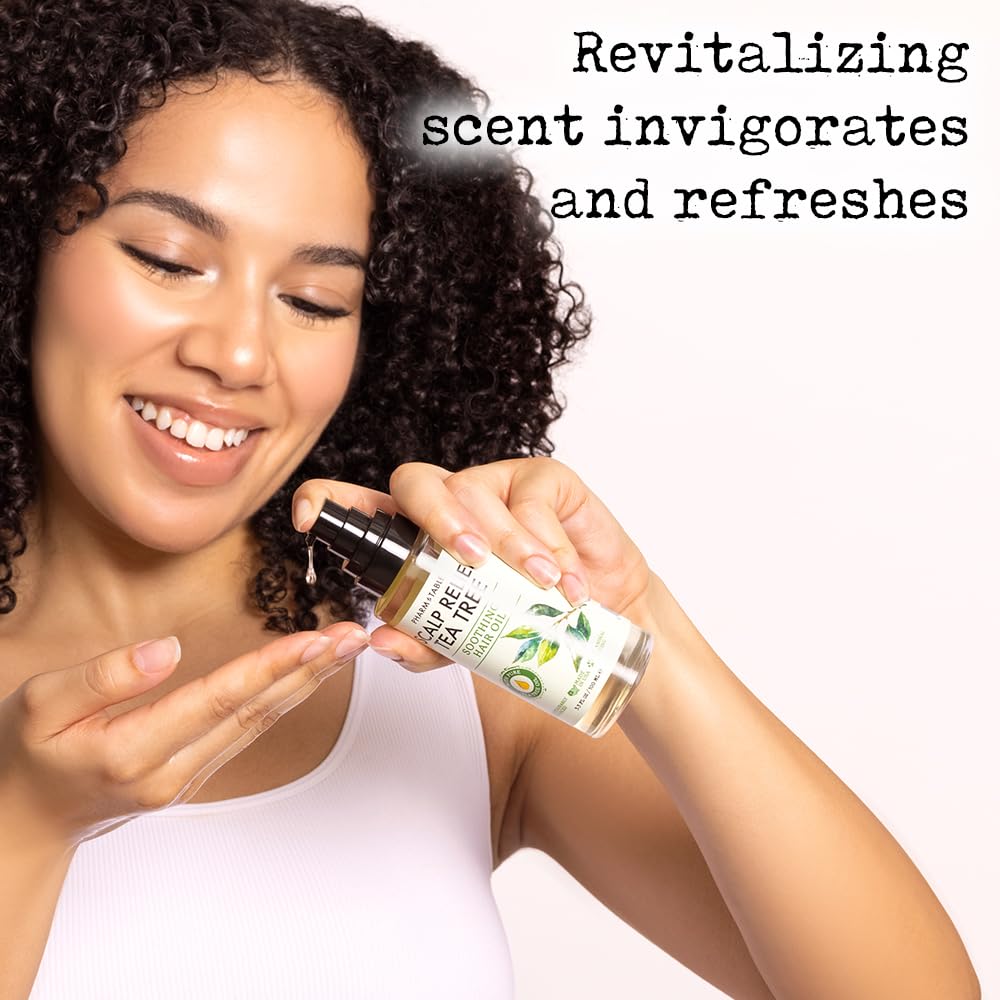 PHARM TO TABLE applying oil to scalp with fingertips for soothing relief