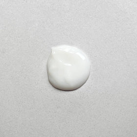 Pharmacopia conditioner texture pouring from bottle highlighting creamy consistency and easy spread