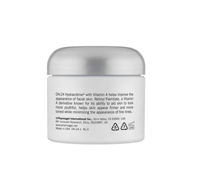 Pharmagel DN-24 cream on fingers demonstrating easy spreadability and absorption