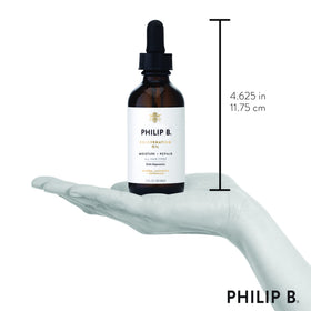 PHILIP B bottle on bathroom shelf styling scene suggesting daily luxury care