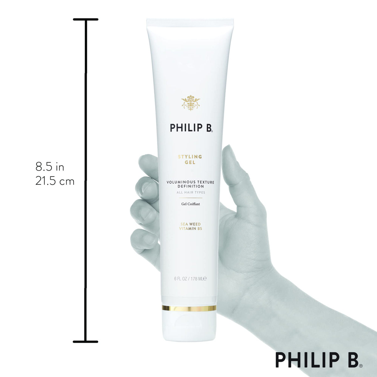 PHILIP B next to a ruler to show the 6 oz size and portability