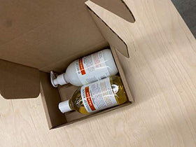 Phillip Adam bottles in hand to show 12 ounce scale and travel convenience