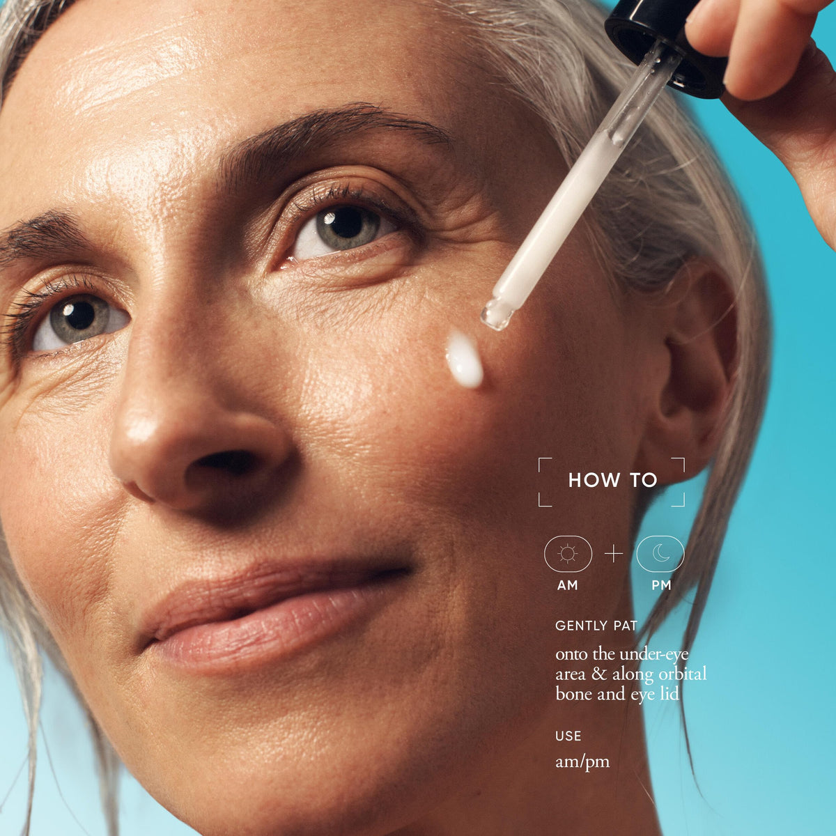 philosophy dose of wisdom serum drop captured mid-air showing concentrated formula benefit