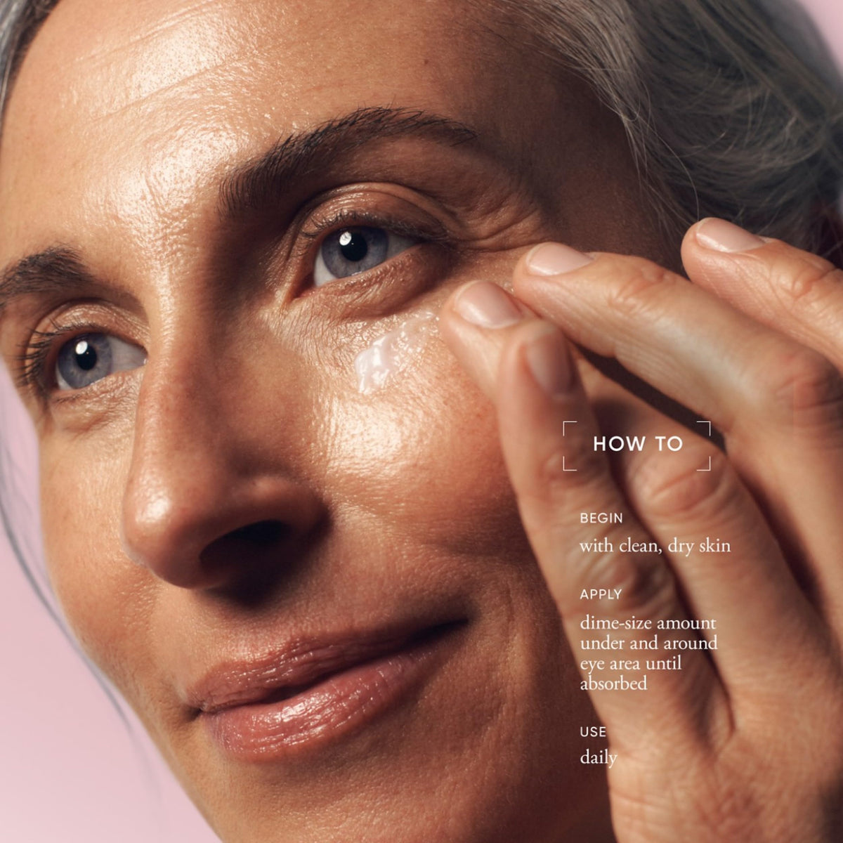 philosophy applying cream under eye to smooth and hydrate skin