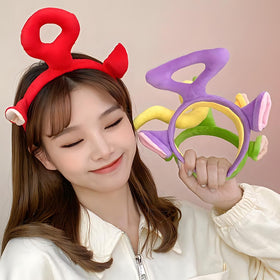 PHQOORYTH model wearing headband at a party showing how it complements costumes