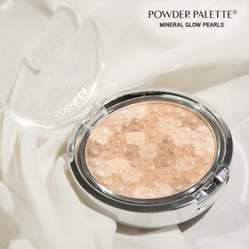 Physicians Formula brush applying palette on cheek demonstrating buildable glow benefit
