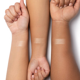Physicians Formula swatch on hand demonstrating blendable sheen and buildable pigmentation