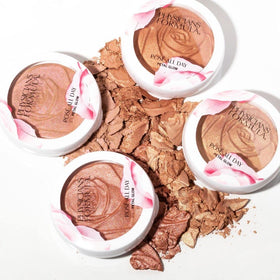 Physicians Formula powder being applied to cheek for long-lasting set benefit