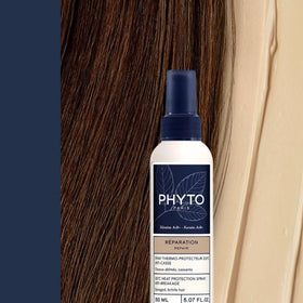 PHYTO in-use with blow-dryer demonstrating heat protection during styling