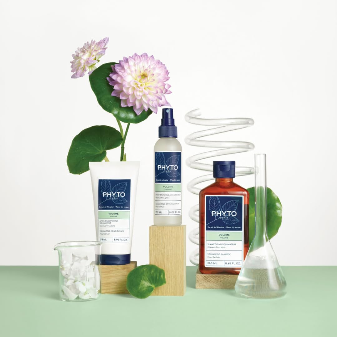 PHYTO bottle held in hand for size comparison and travel-friendly benefit