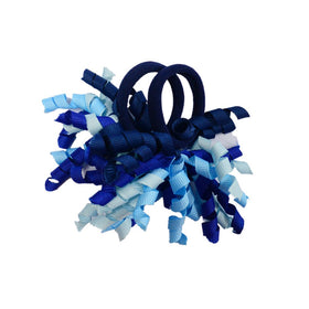 PIDOUDOU bow worn in a child's ponytail demonstrating secure styling and comfortable wear all day