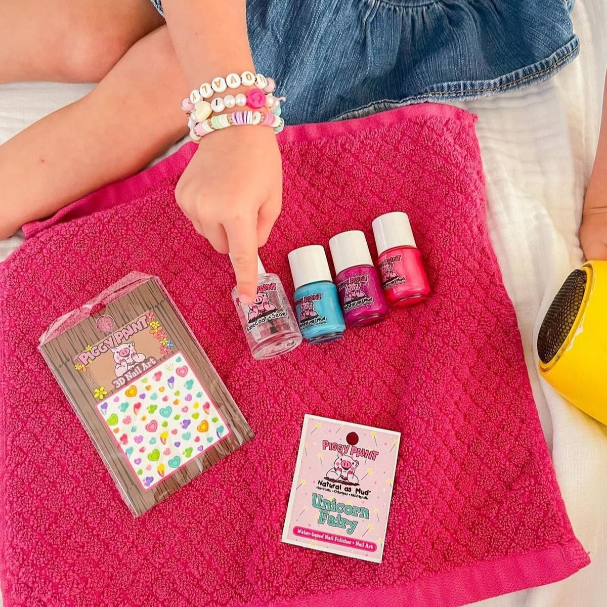 Piggy Paint kids painting nails together demonstrating safe fun