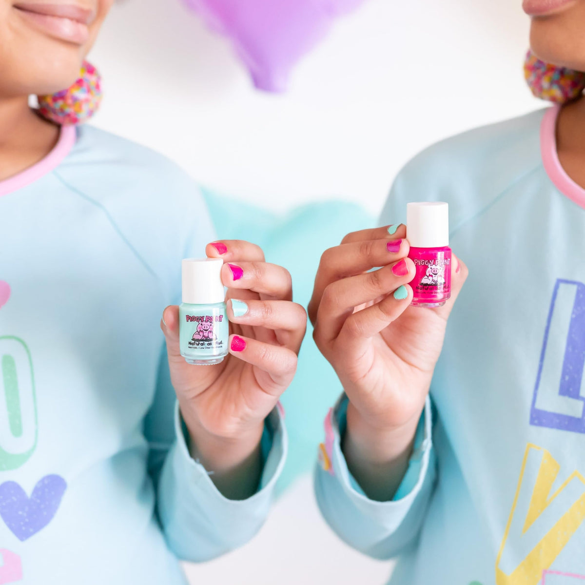 Piggy Paint lifestyle scene of child doing manicure in bedroom playtime