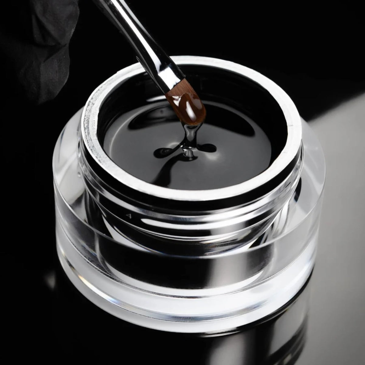 PINK MASK gel on brush during sculpting showing smooth pick-up and coverage benefit