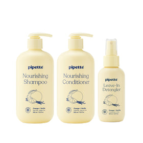 Pipette front packaging trio showing bottles and orange vanilla scent benefit