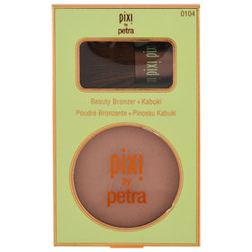 Pixi bronzer with kabuki brush in hand demonstrating smooth application benefit