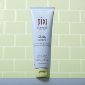 Pixi clarity cleanser in hand for size scale showing travel-friendly 4.6 fl oz advantage