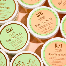 Pixi pad being swept across hand showing how to neutralize and rinse