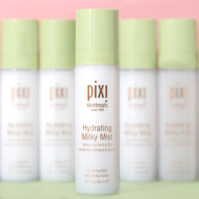 Woman using Pixi Milky Mist in morning routine for hydrated skin