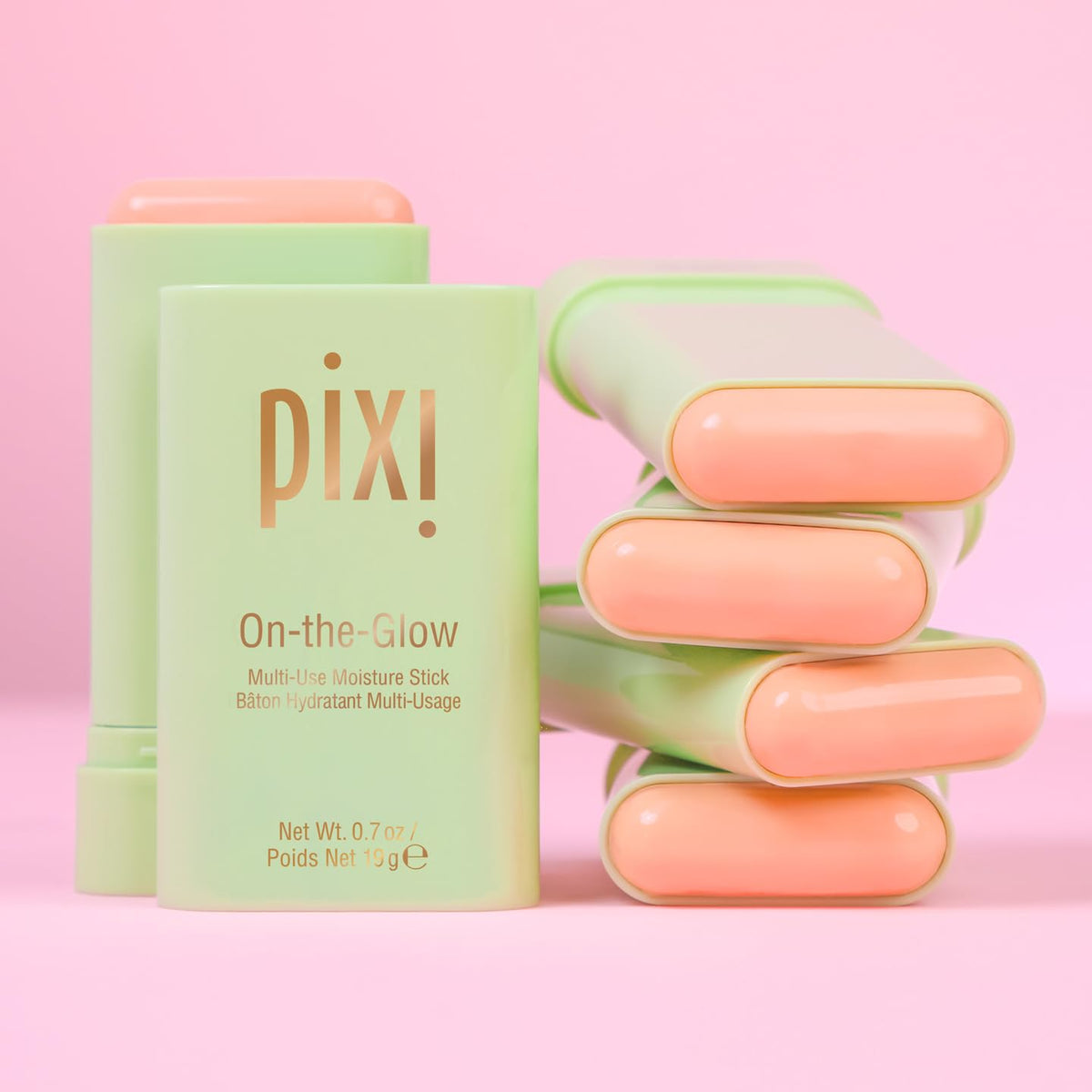Pixi On-the-Glow applied to cheek highlighting quick facial moisture boost