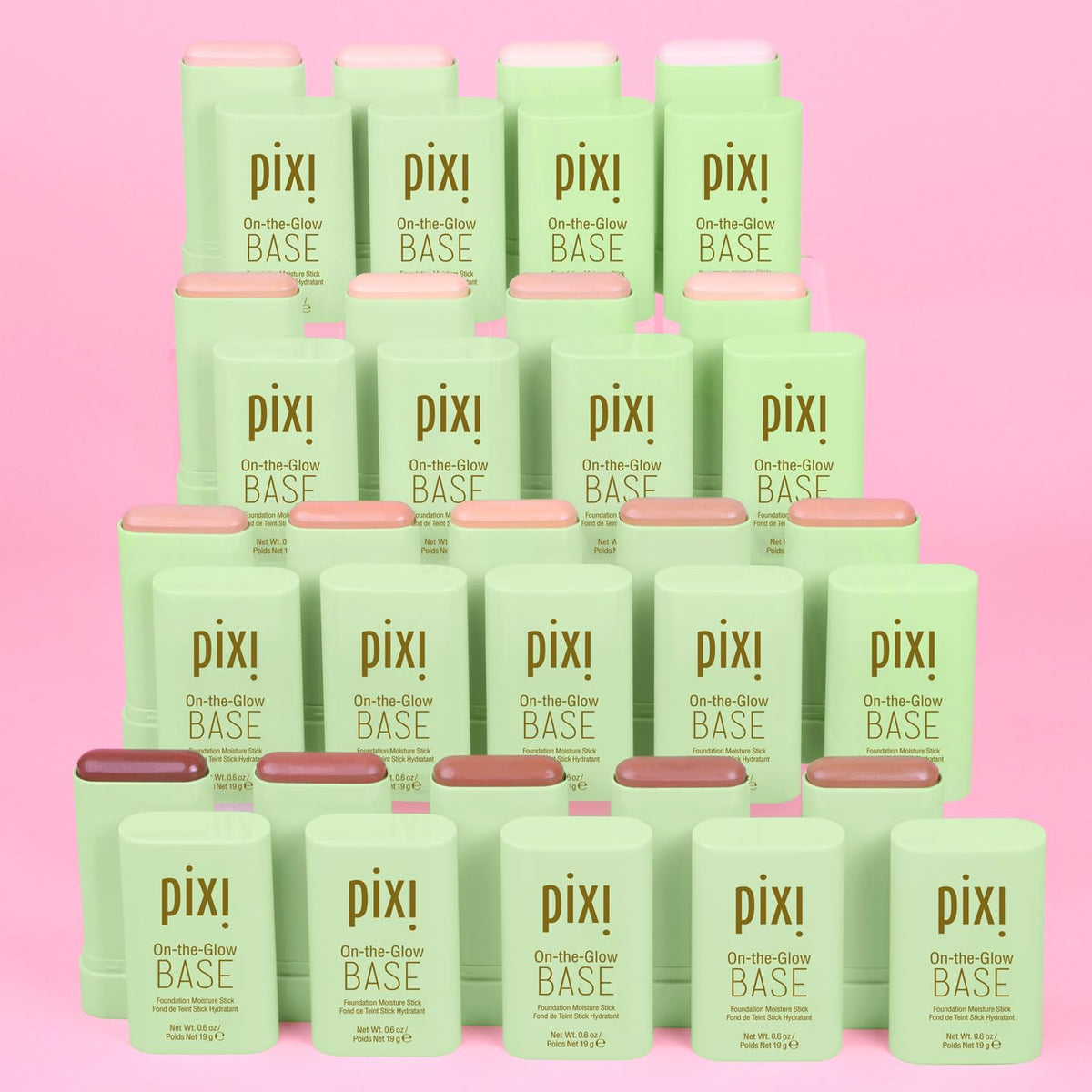 Pixi On-the-Glow held in hand to show size and portability benefit