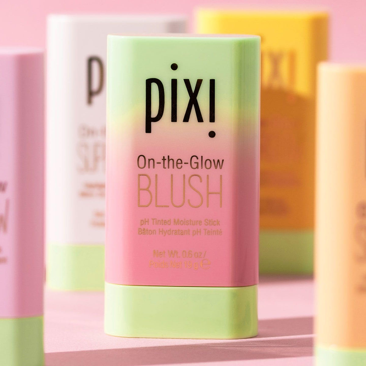 Pixi On-the-Glow swiped on cheek showing natural dewy color payoff