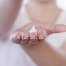 Pixi application image of cream on face showing lightweight layering in morning routine