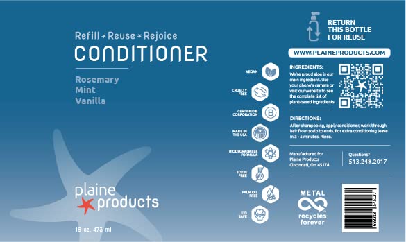 Plaine Products bottles on bathroom shelf styled for sustainable daily routine