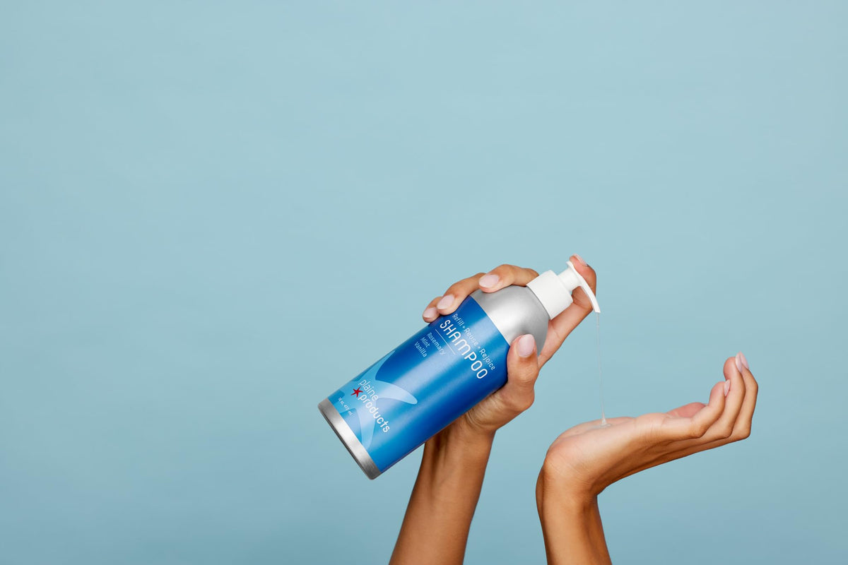 Plaine Products conditioner close-up showing creamy texture for smooth, hydrated hair