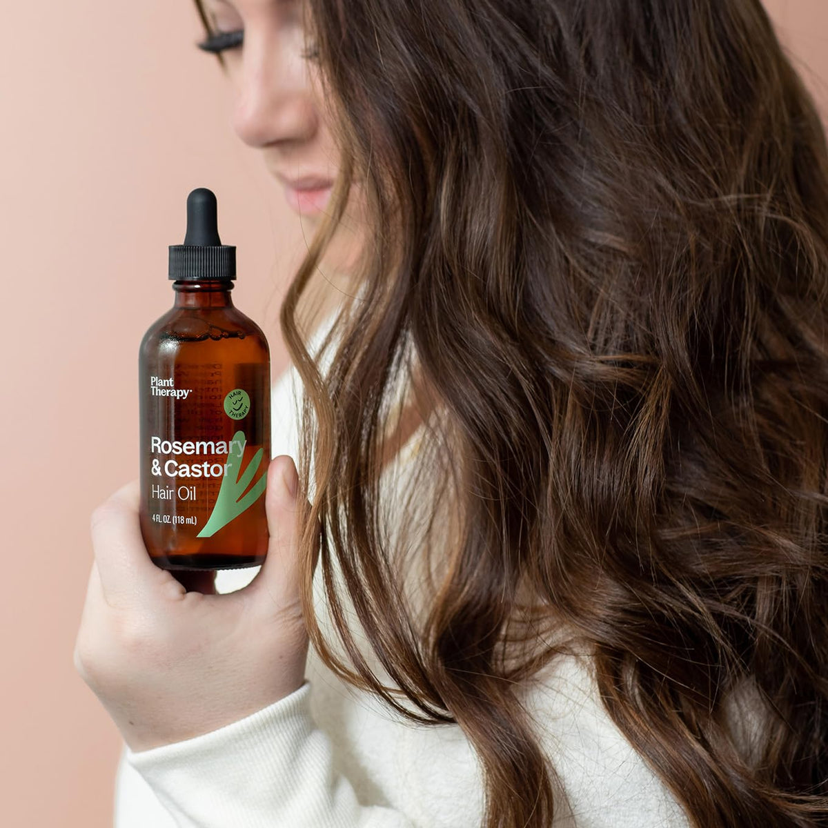 Plant Therapy sweet almond oil pour detail illustrating moisturizing and shine enhancement