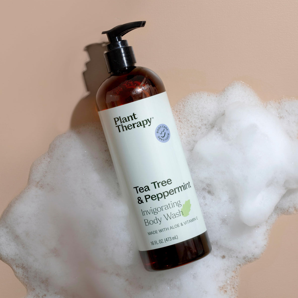 Plant Therapy bottle on shower shelf demonstrating daily use and quick-rinse benefit