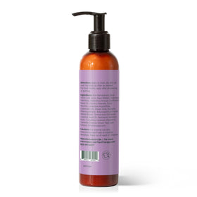 Plant Therapy 8 oz bottle beside a hand for scale showing compact travel-friendly size