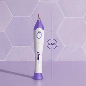 Plum Beauty hand-held drill showing size and comfortable ergonomic grip for control