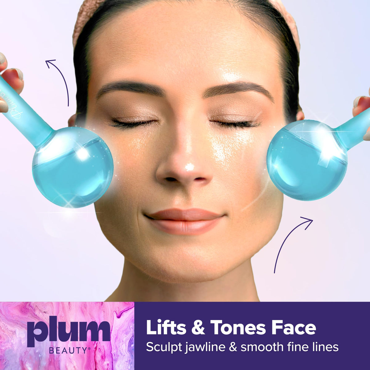 Plum Beauty globe held in hand showing size and ergonomic benefit for precise massage