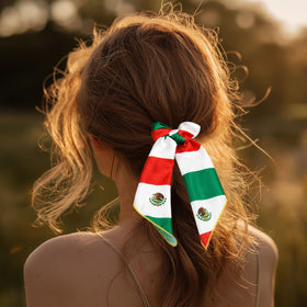 PMAIHNAS headband worn by model at outdoor event for festive styling
