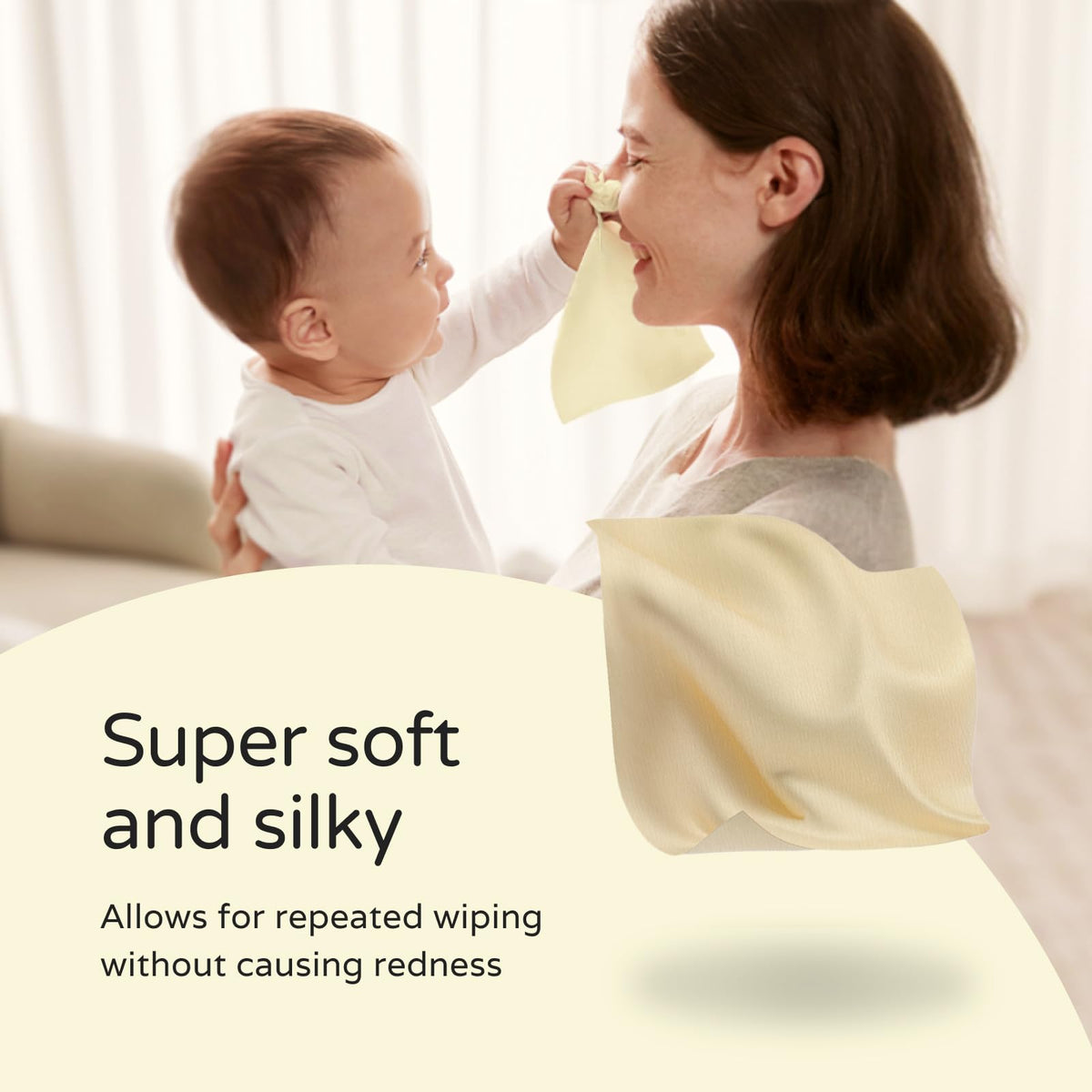 PoeticEHome towel held in hand demonstrating gentle feel and durable wet strength