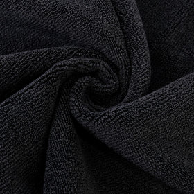 POLYTE towel beside a hand showing 16x29 in scale and coverage benefit