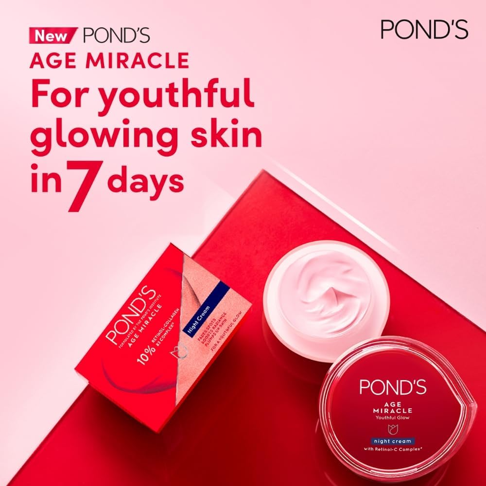 Open POND'S jar beside pillow suggesting overnight repair benefits