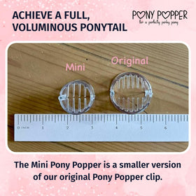 Pony Popper paired with hair tie showing compatibility and added security benefit