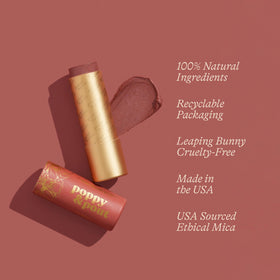 Poppy & Pout open tube texture close-up, showing smooth balm and easy application benefit