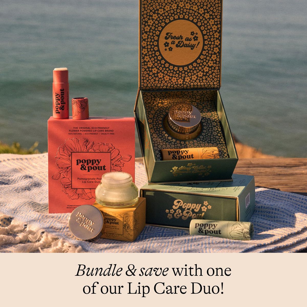 Poppy & Pout jar staged on beach towel evoking tropical scent and freshness